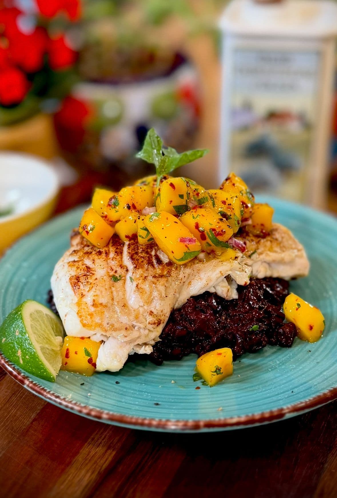 Pan-Seared Halibut with Mango Salsa & Saffron Black Rice
